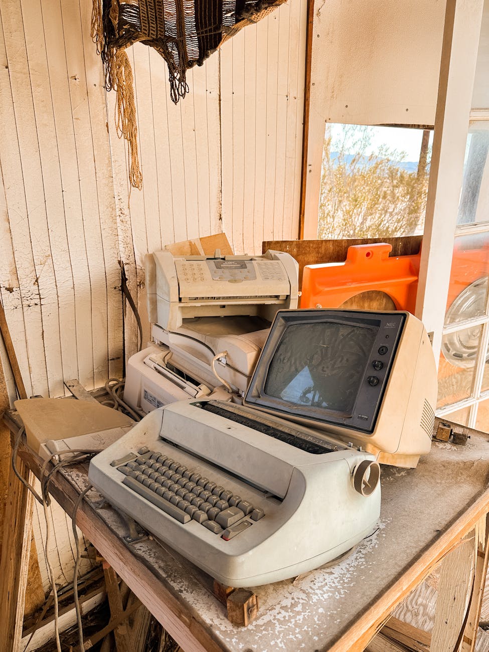 old typewriter and tv set